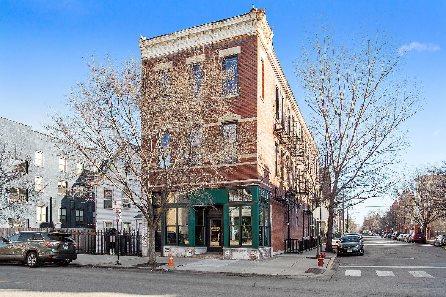 a view of a building with a street