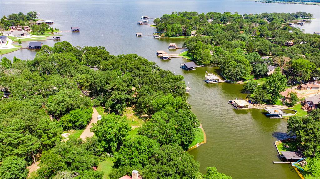 an aerial view of lake houses with outdoor space