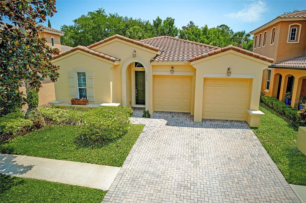 a front view of a house with yard