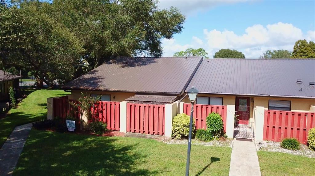 a view of a house with a swimming pool