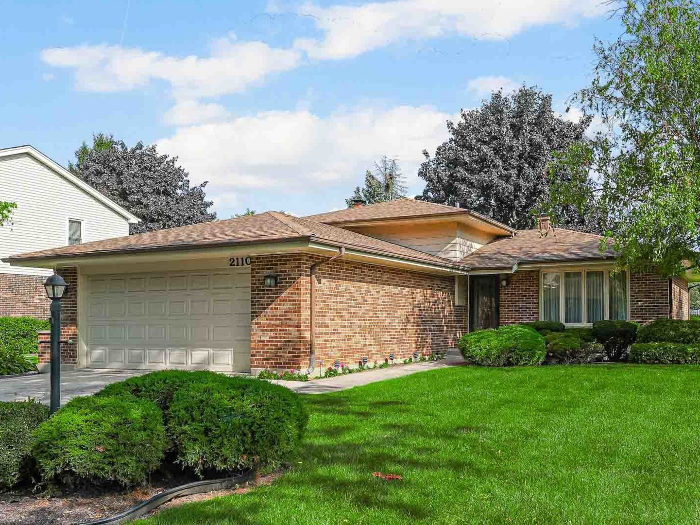 a view of outdoor space yard and front view of a house