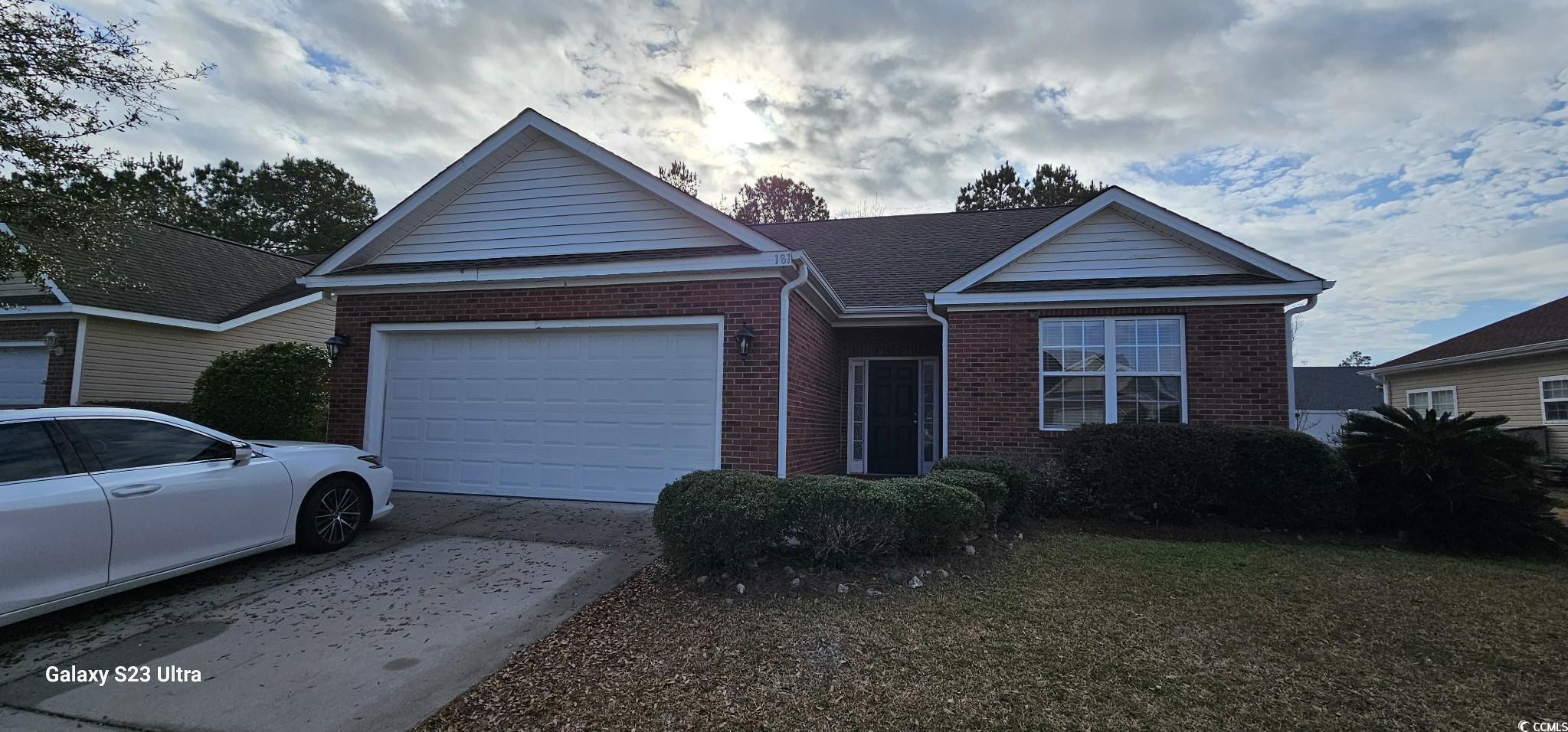 View of front facade with a garage