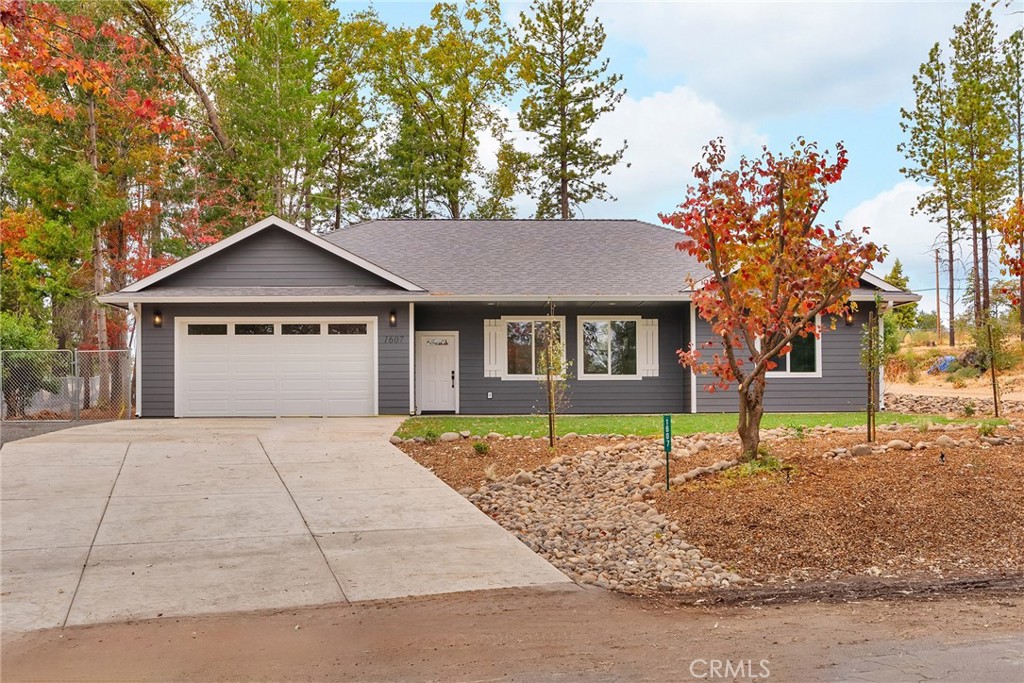 a house with trees in the background