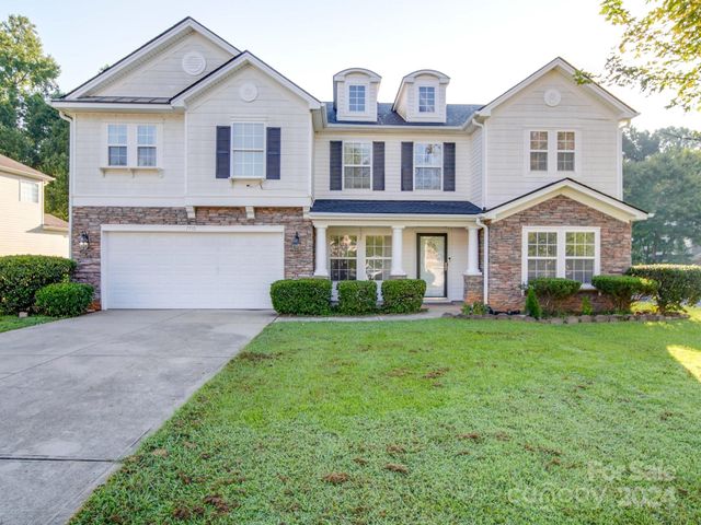 $515,000 | 7710 Brookwood Valley Lane | Versage