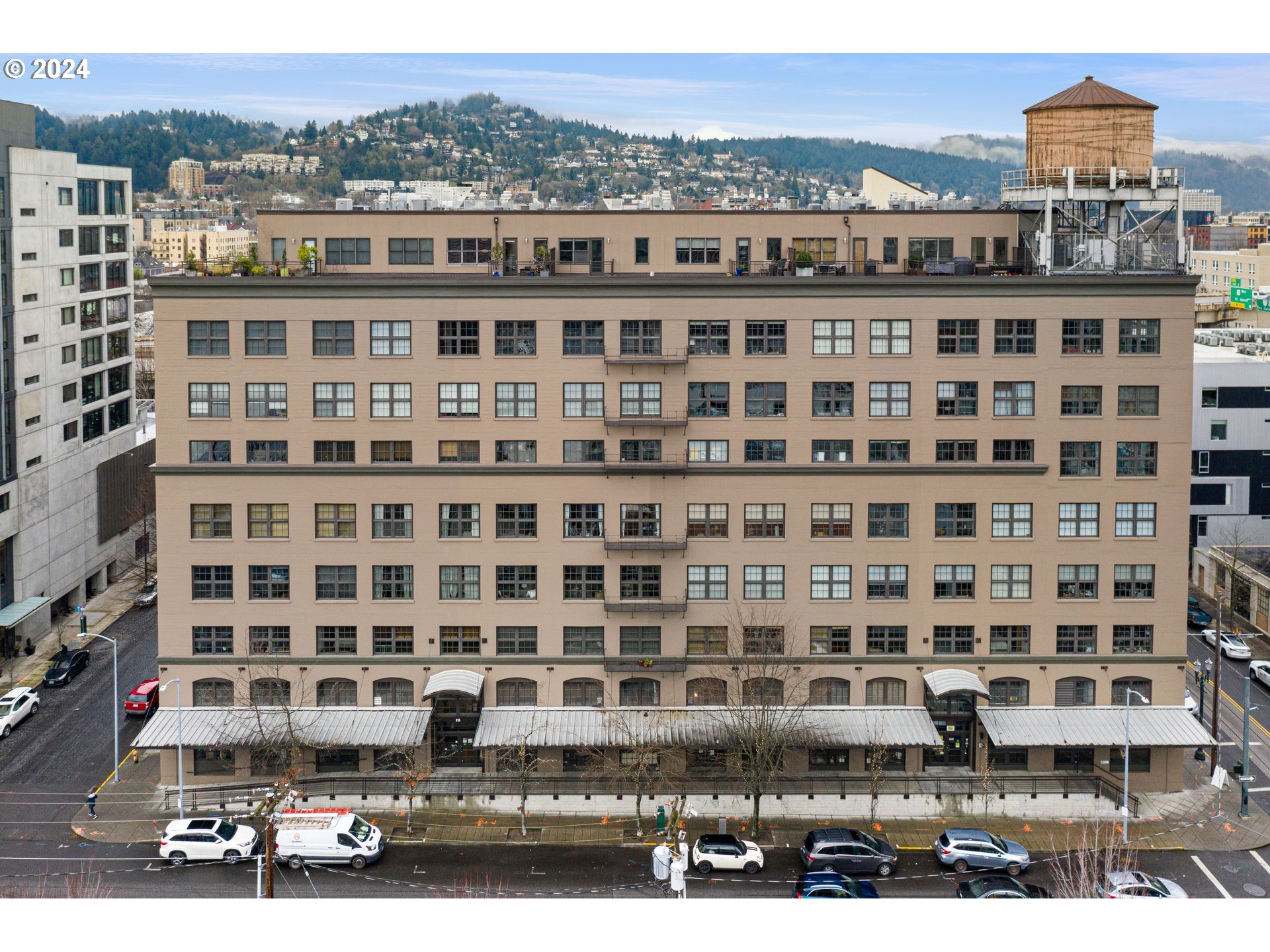 a view of a building with a city street