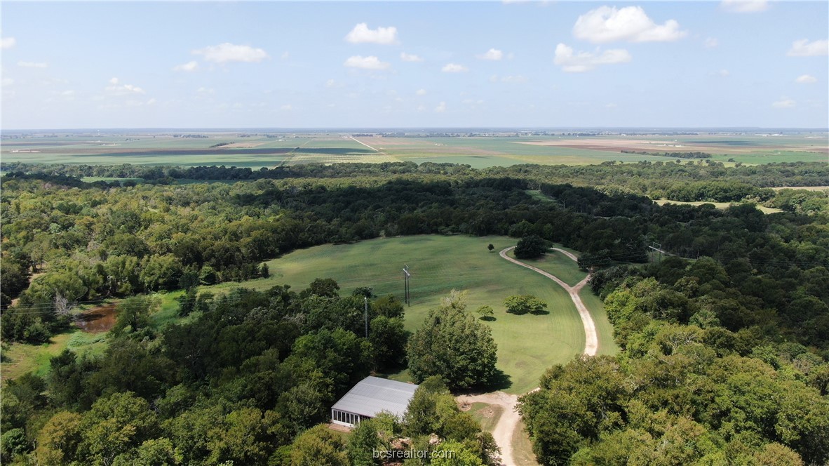 an aerial view of a golf course with a yard