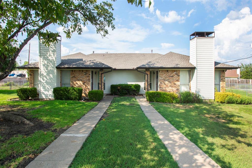 a front view of house with yard