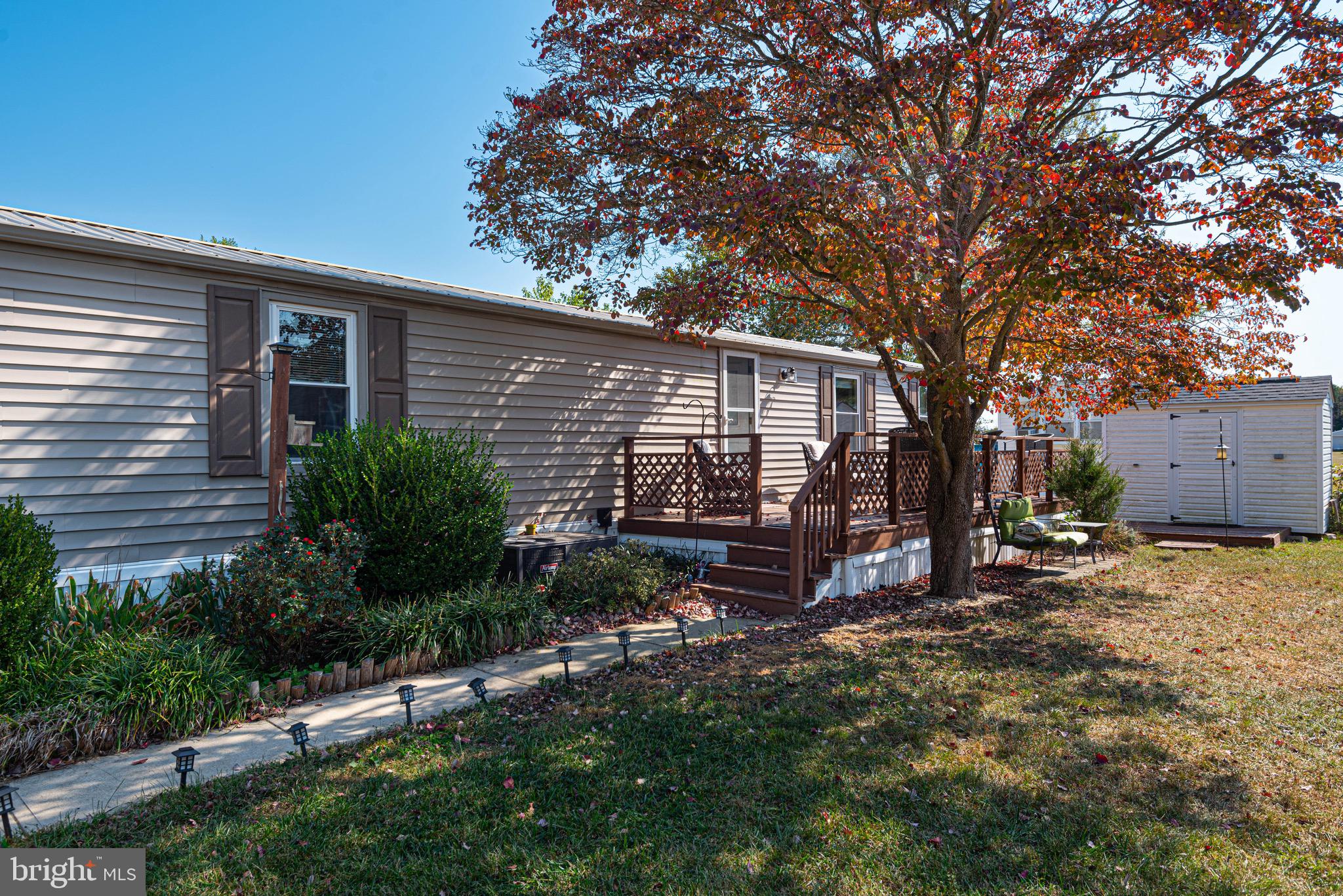 a view of backyard with green space