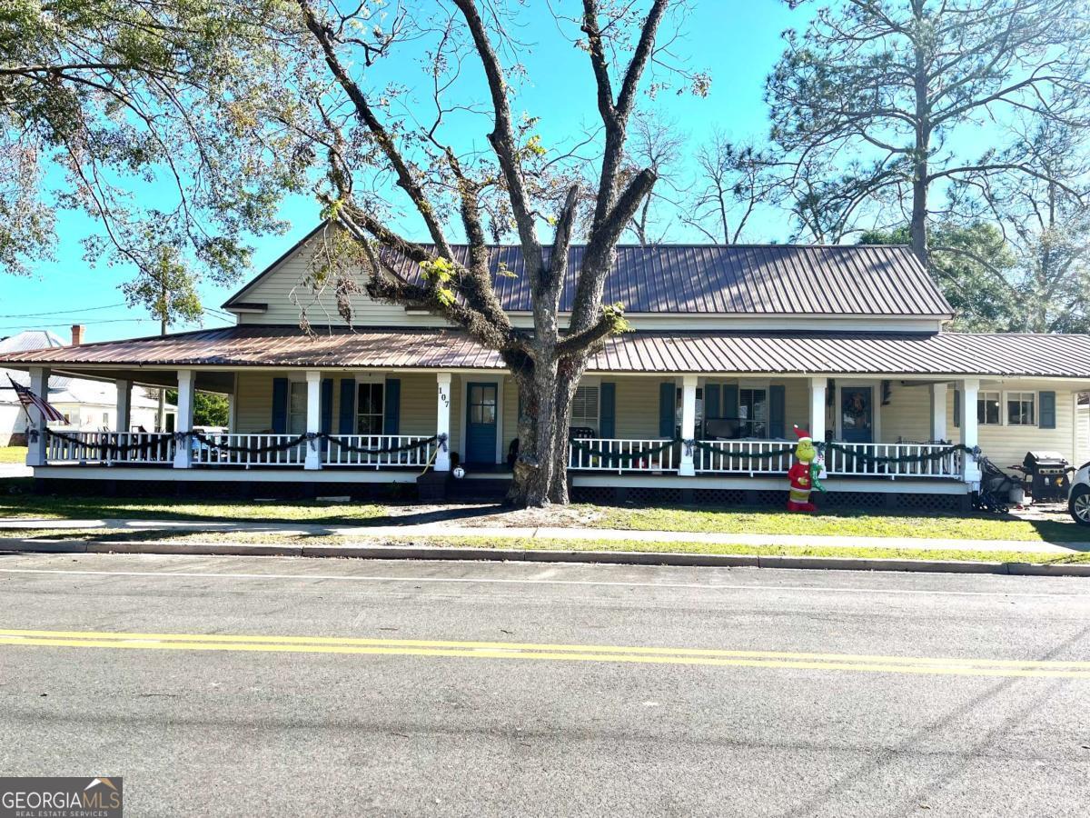 a view of a house with a swimming pool