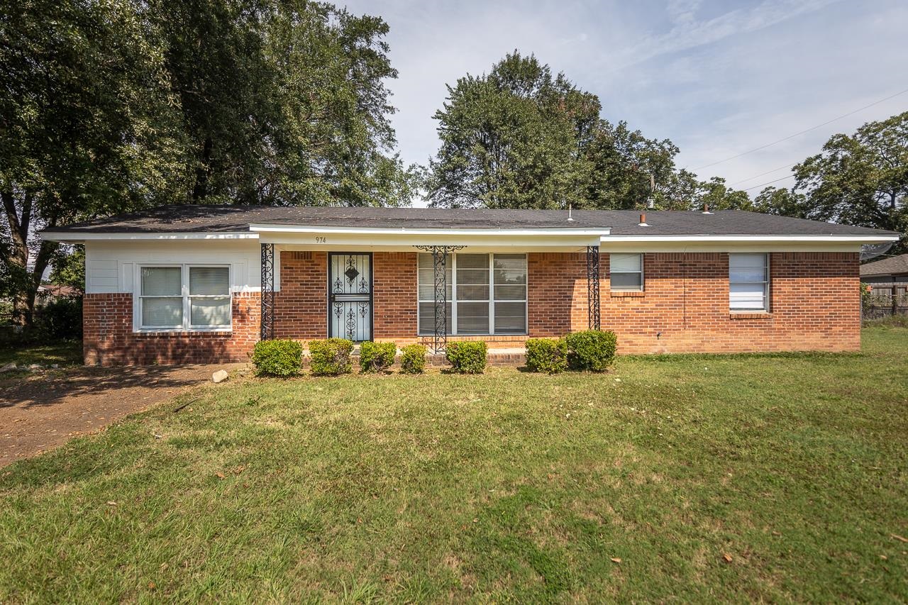 front view of house with a yard