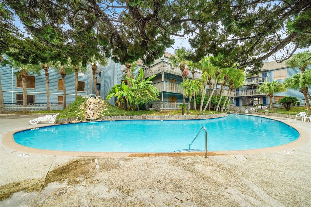 a view of a swimming pool with an outdoor space