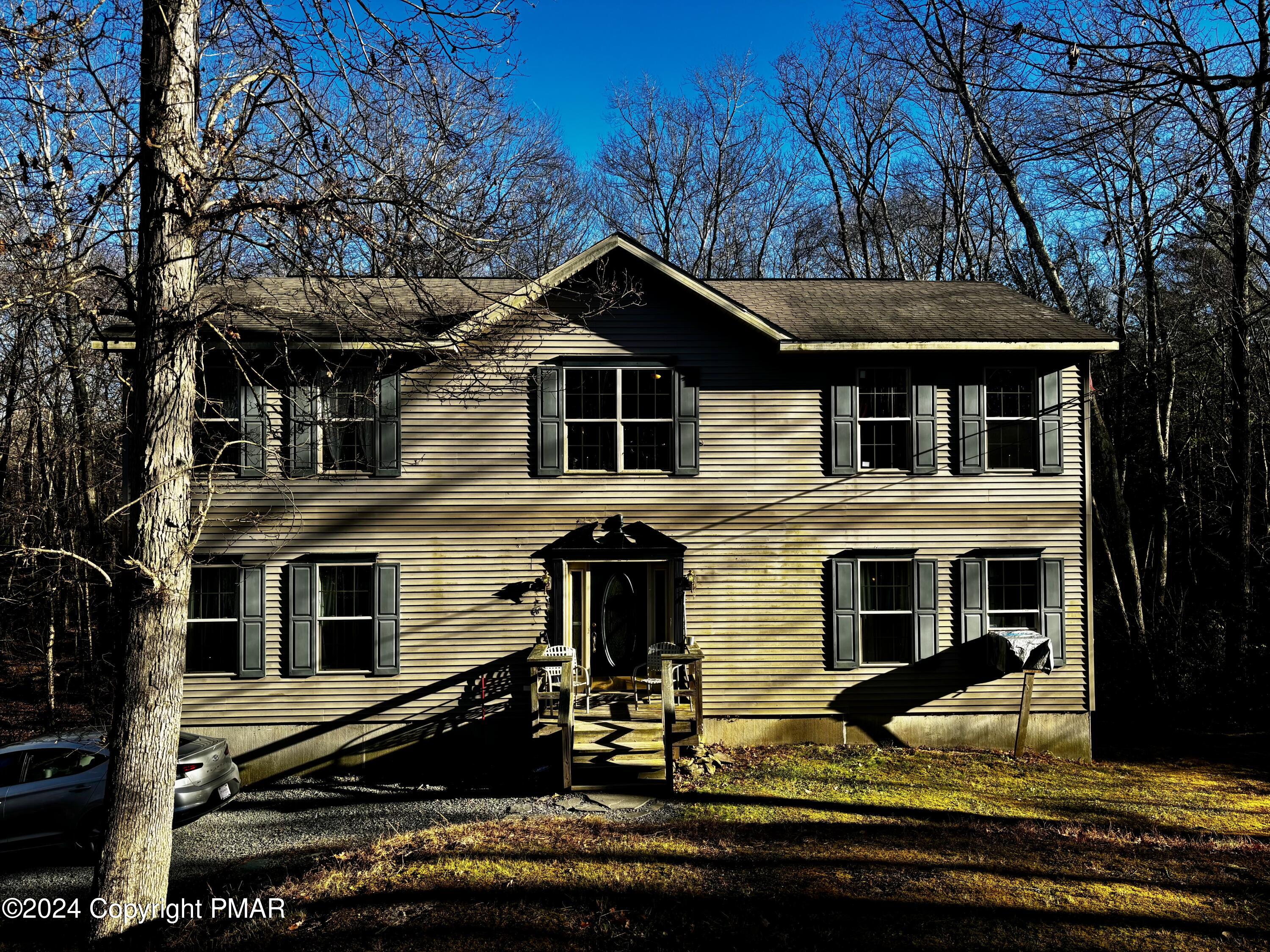 a front view of a house with windows