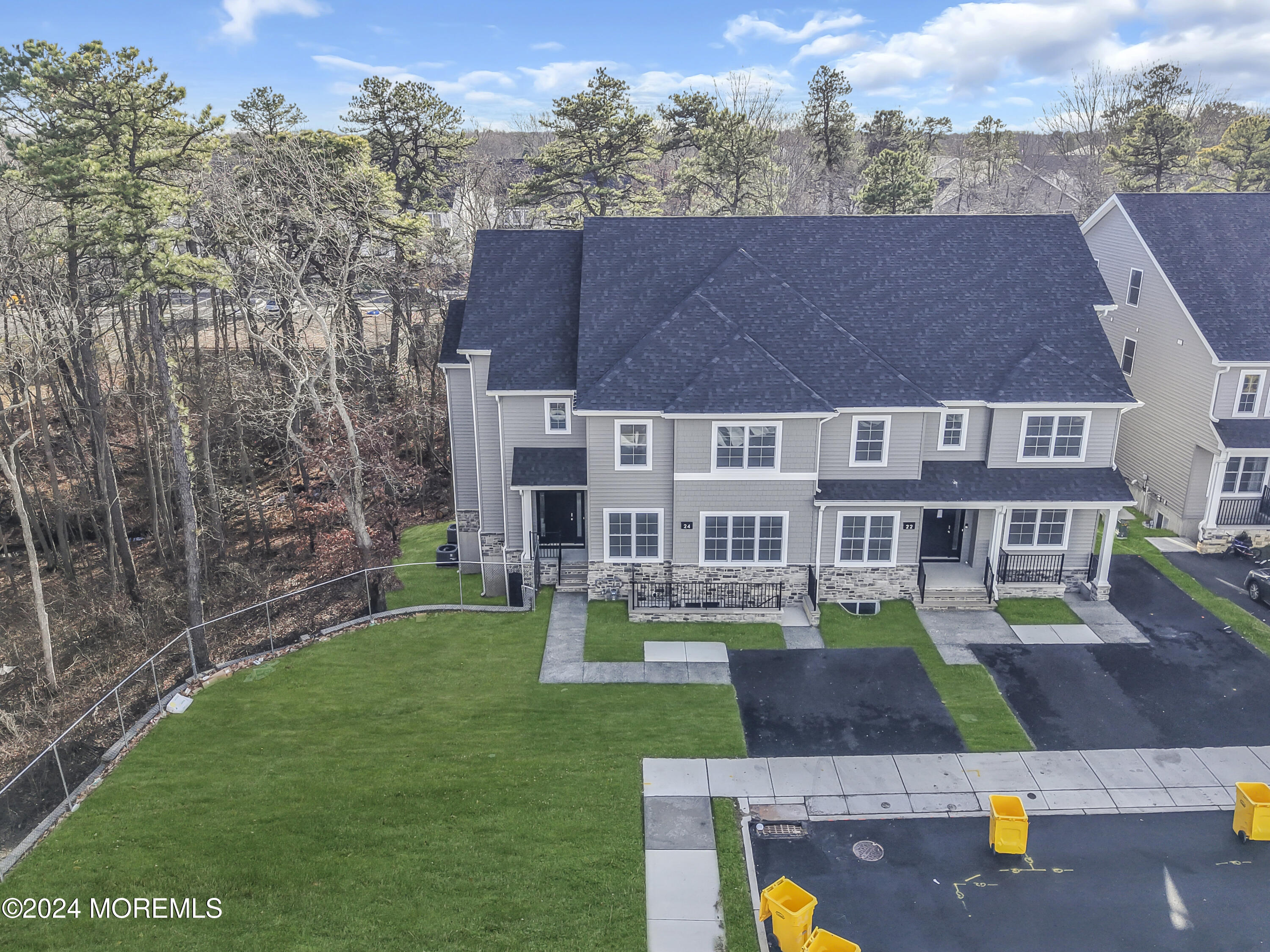 a aerial view of a house with a swimming pool