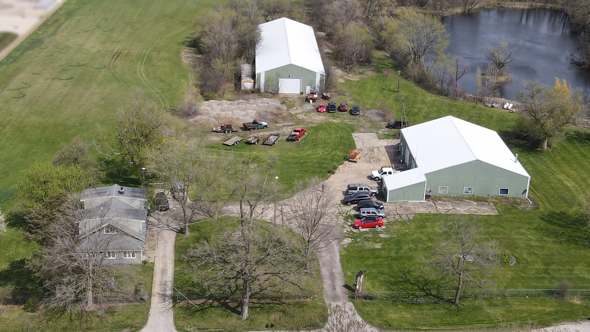 an aerial view of a house with outdoor space