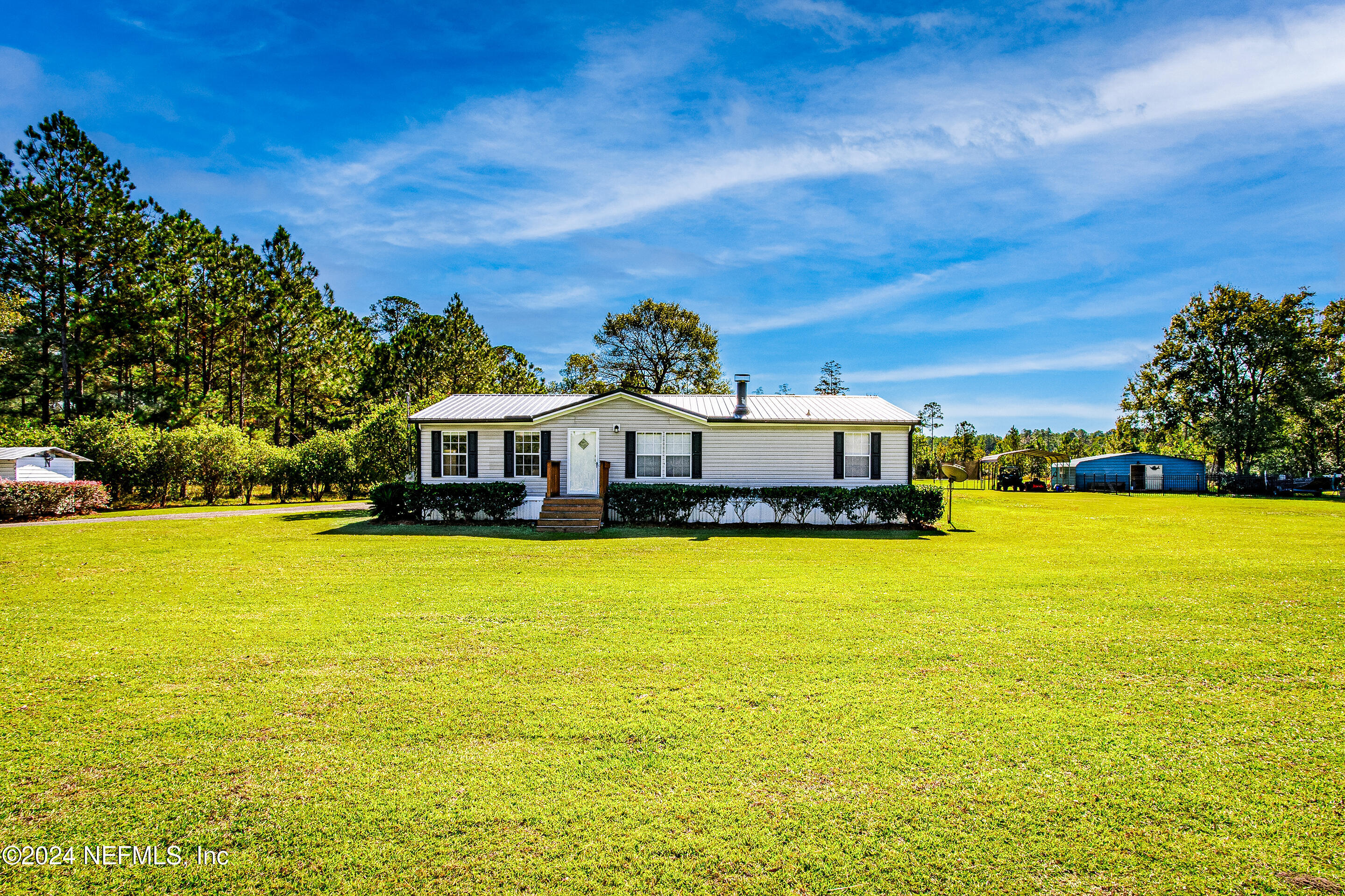 a front view of house with ocean view