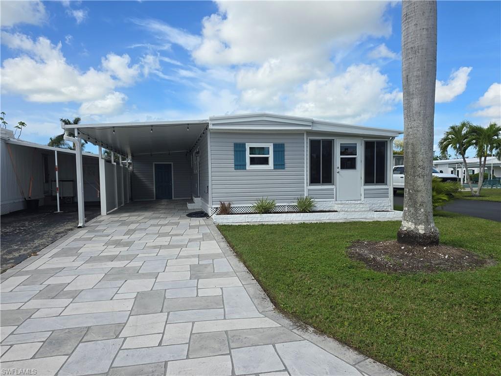 a front view of house with yard