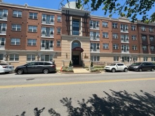 a car parked in front of a building