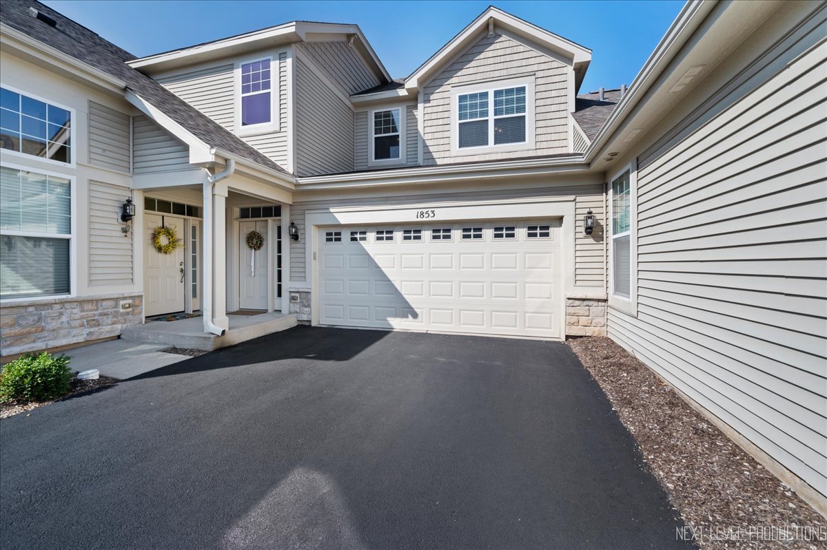 a view of a house with a garage