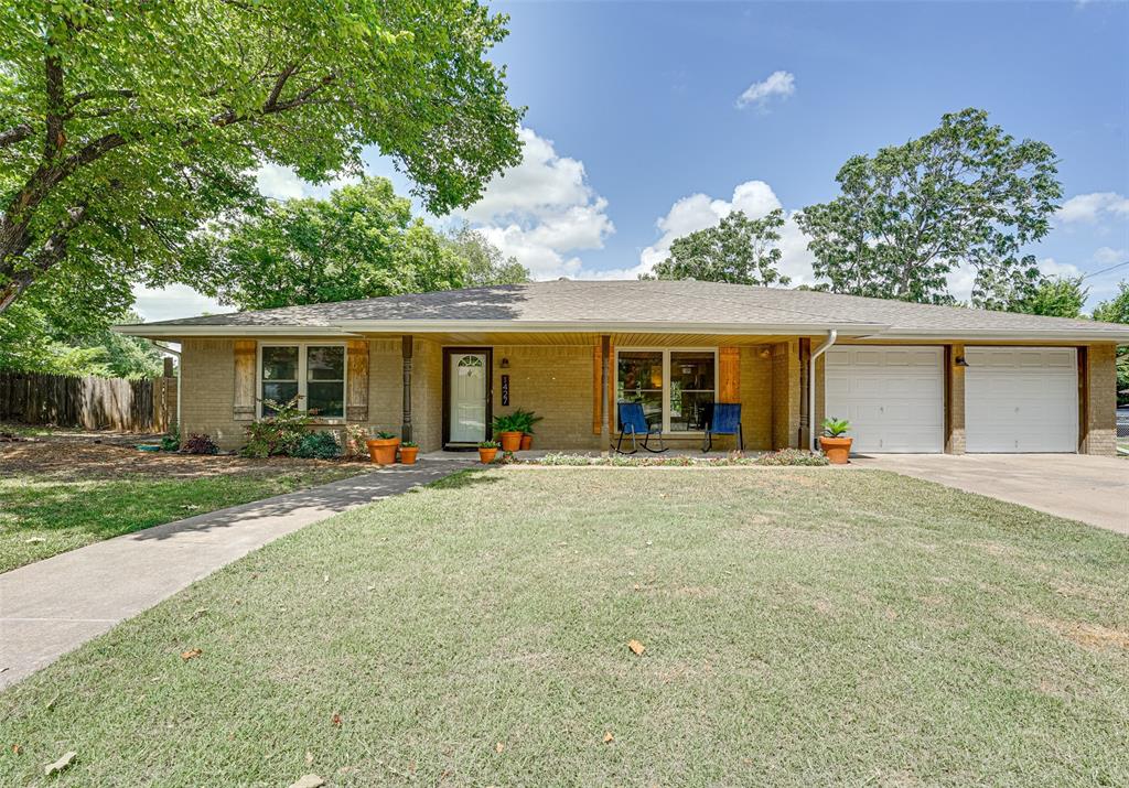 front view of a house with a patio