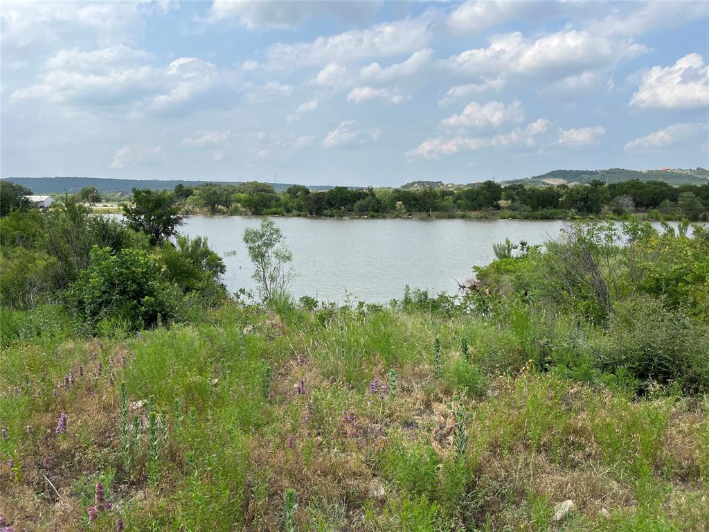 a view of a lake from a yard