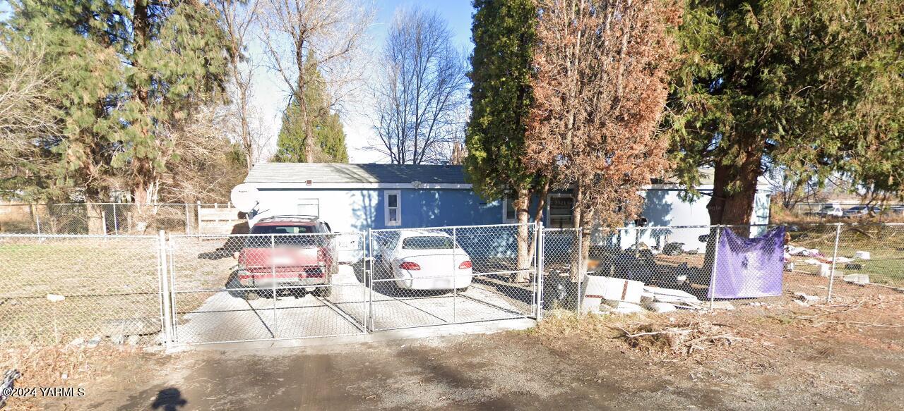 a view of a patio with a yard