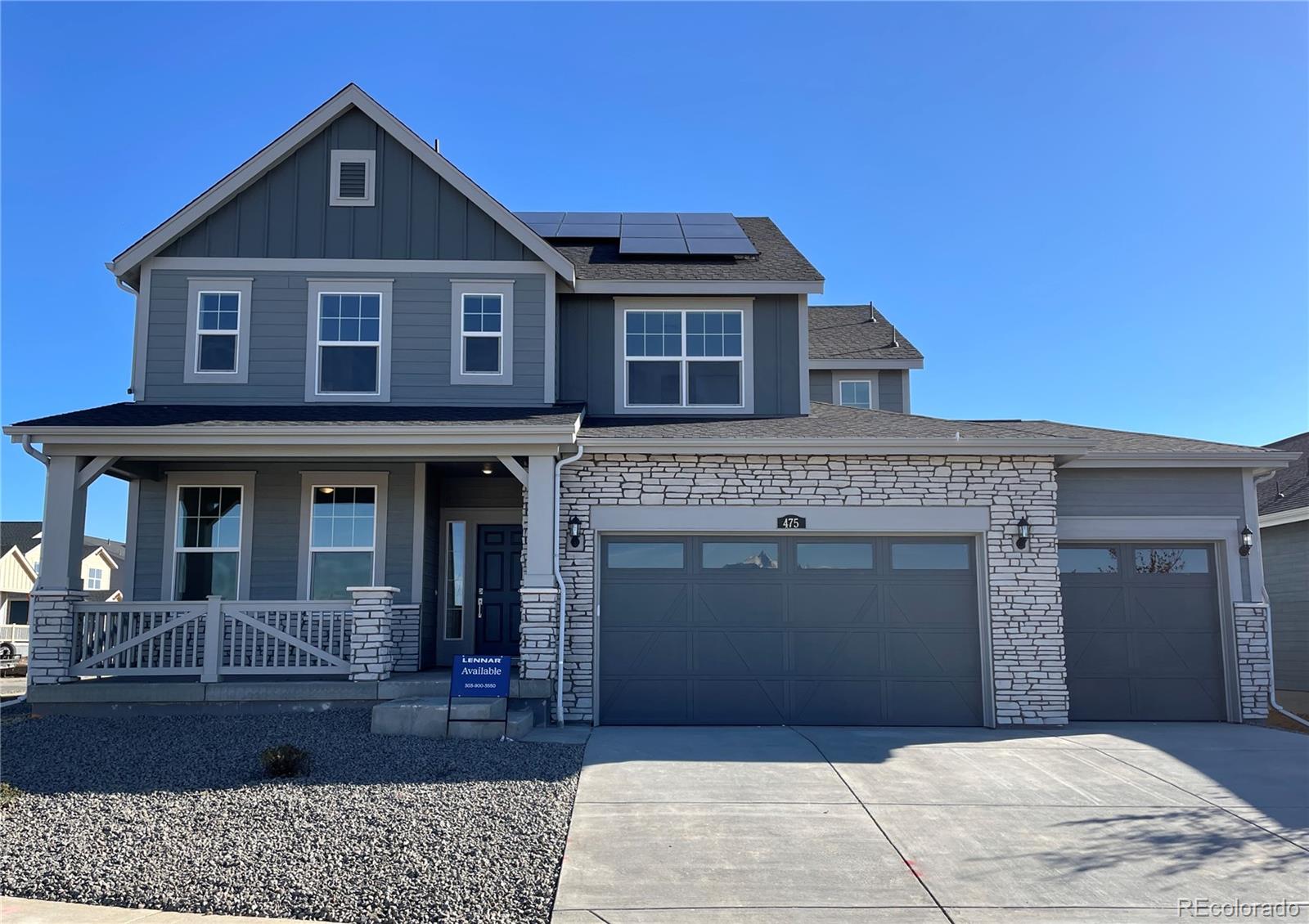 a front view of a house with garage