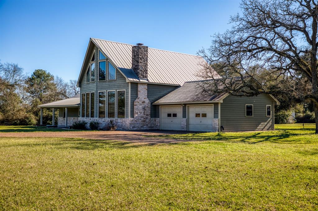 a front view of a house with swimming pool