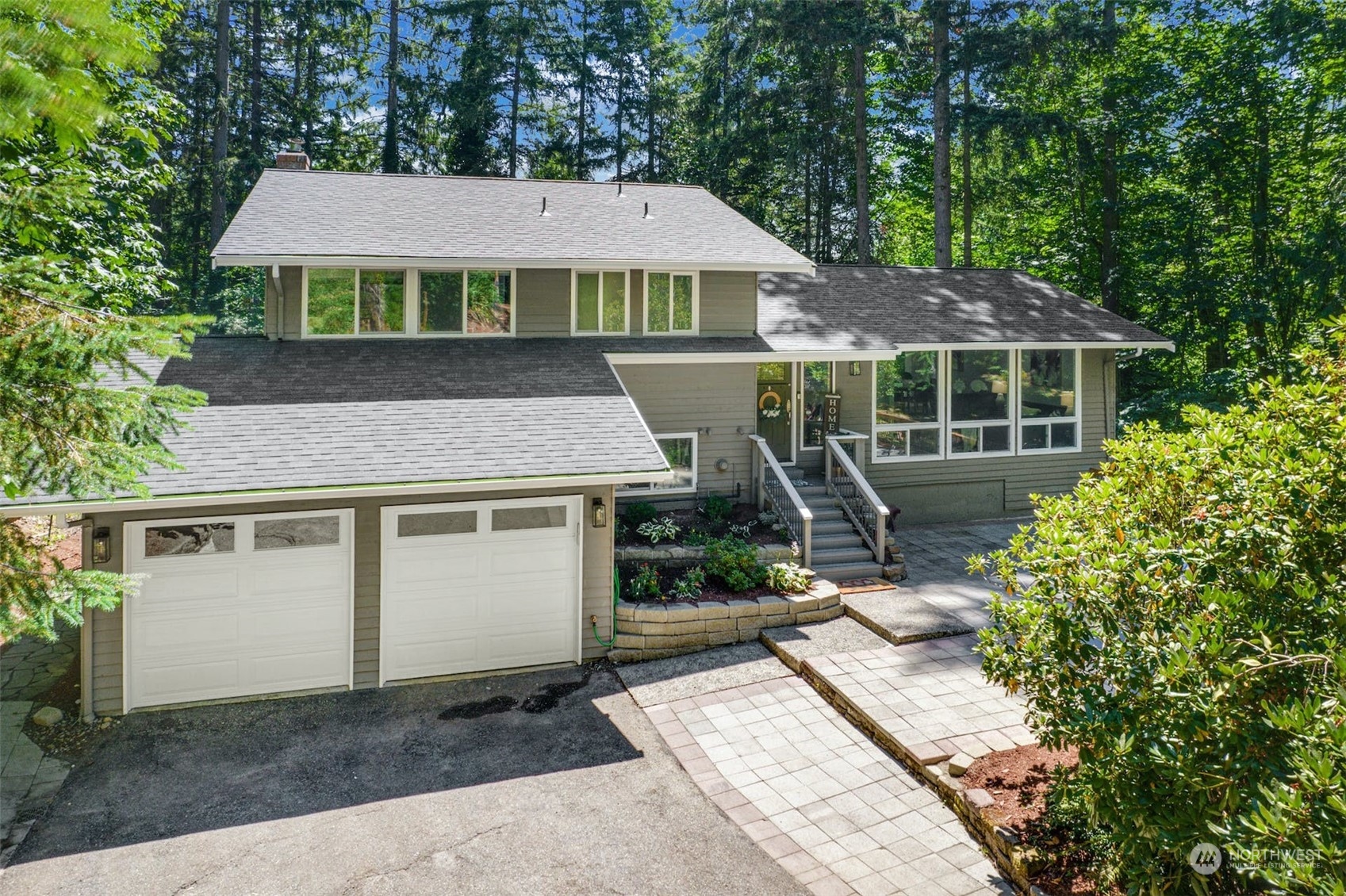 a house view with a garden space