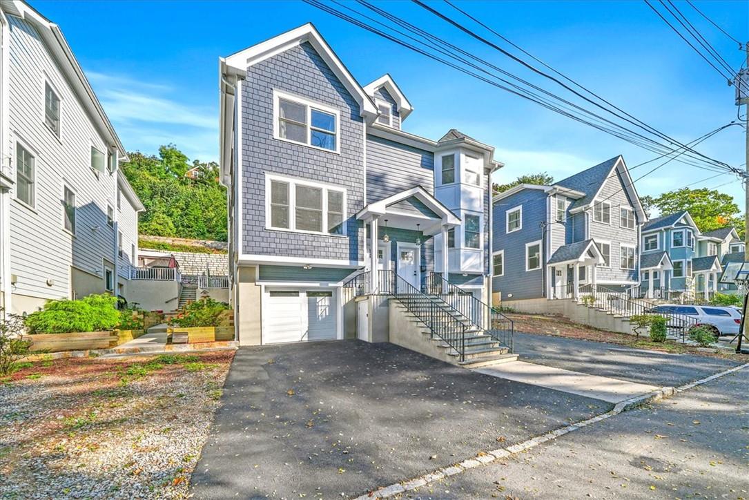 View of front of home with a garage