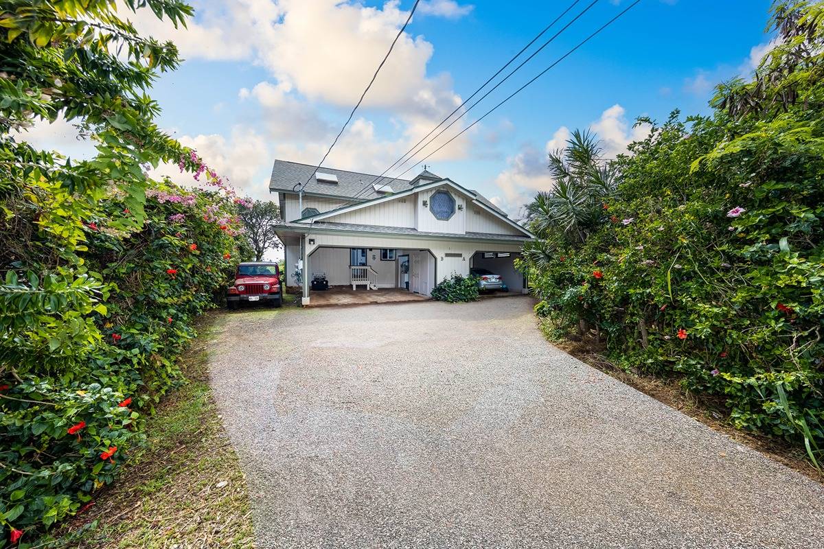 Large Duplex with two, three-story homes an extra loft within walking distance to the beach and Kapaa Bike path.