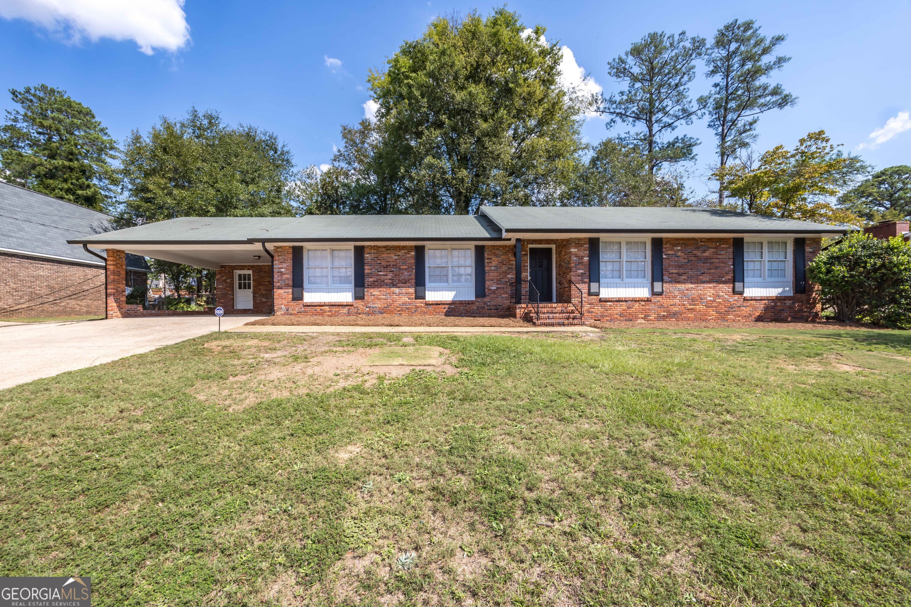 front view of a house with a yard