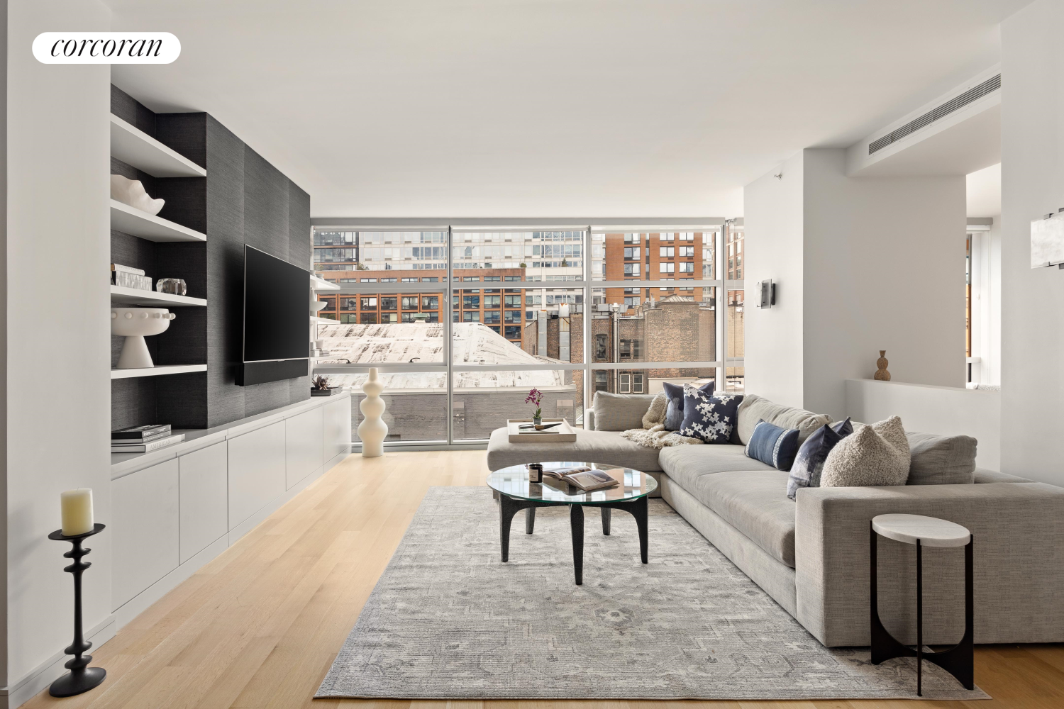 a living room with fireplace furniture and a flat screen tv