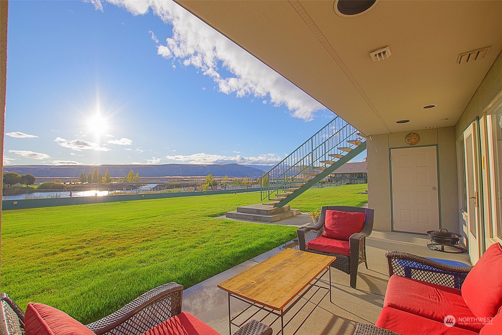 a building outdoor space with patio furniture