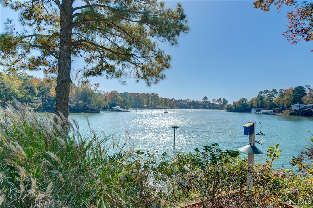 a view of a lake view with mountain in the back