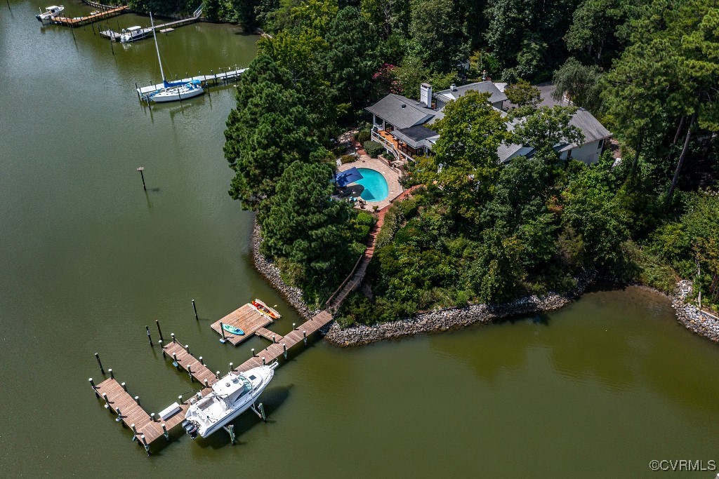 Bird's eye view showing new dock, pool and renovat