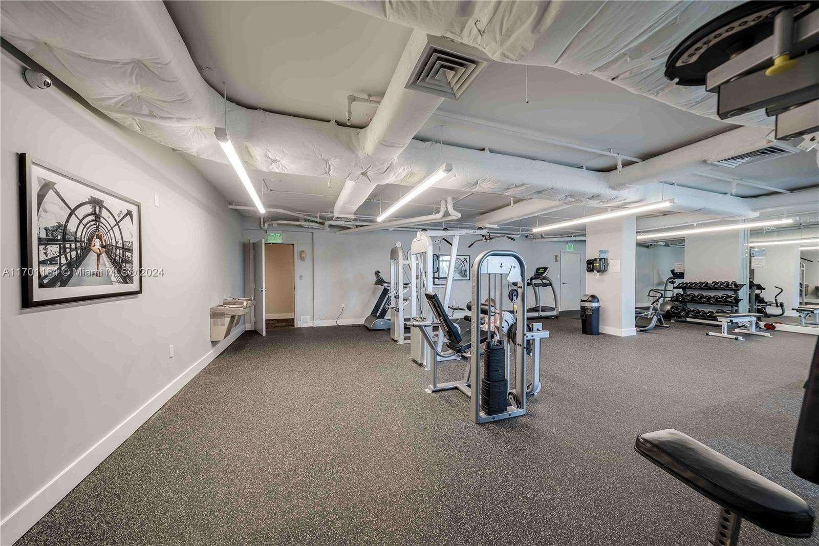 a view of a room with gym equipment