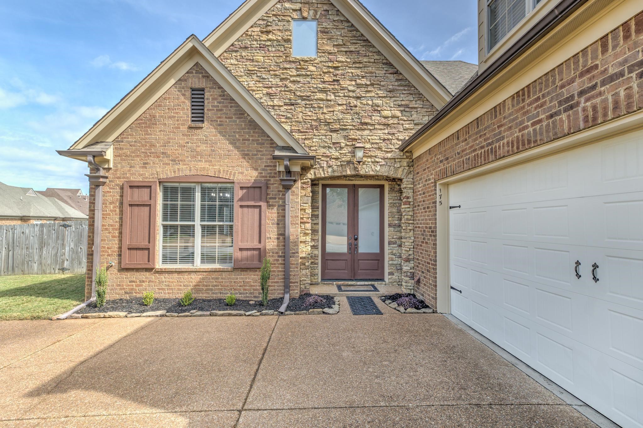 a view of house with outdoor space