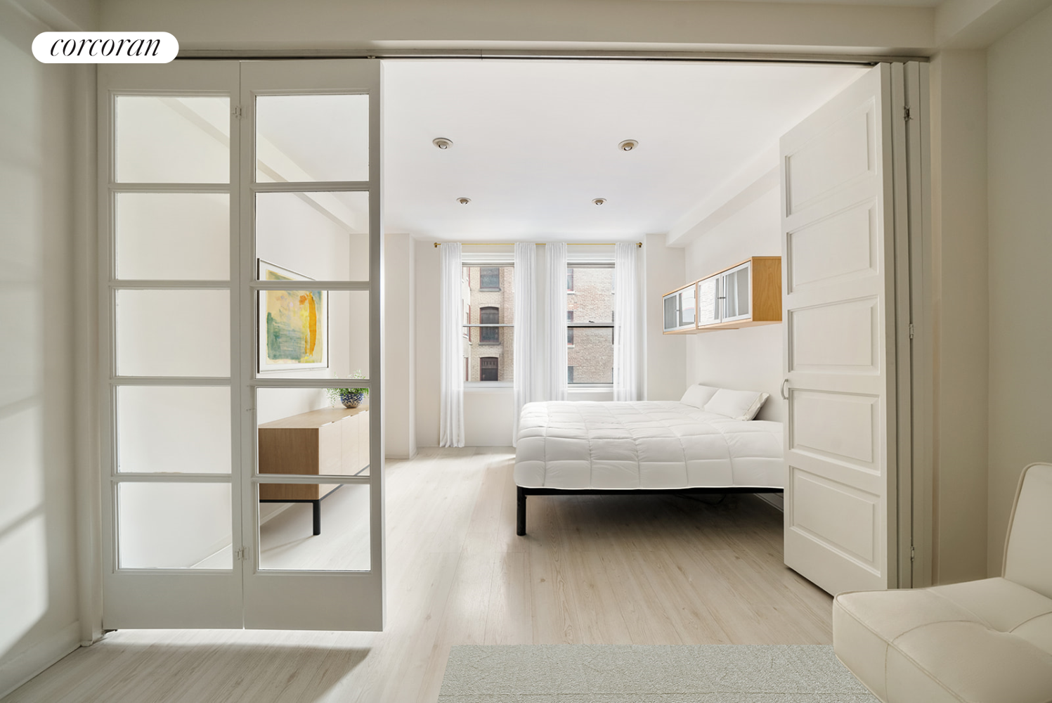 a view of living room with furniture and window