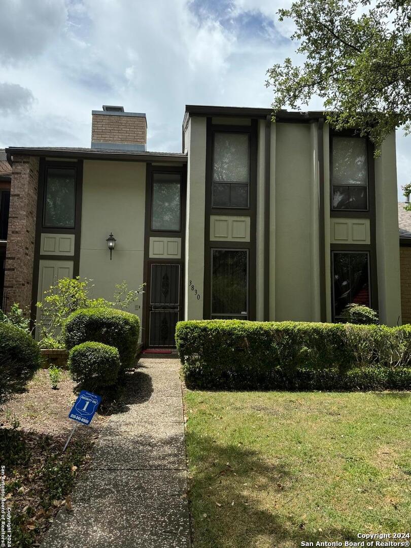 a front view of a house having yard