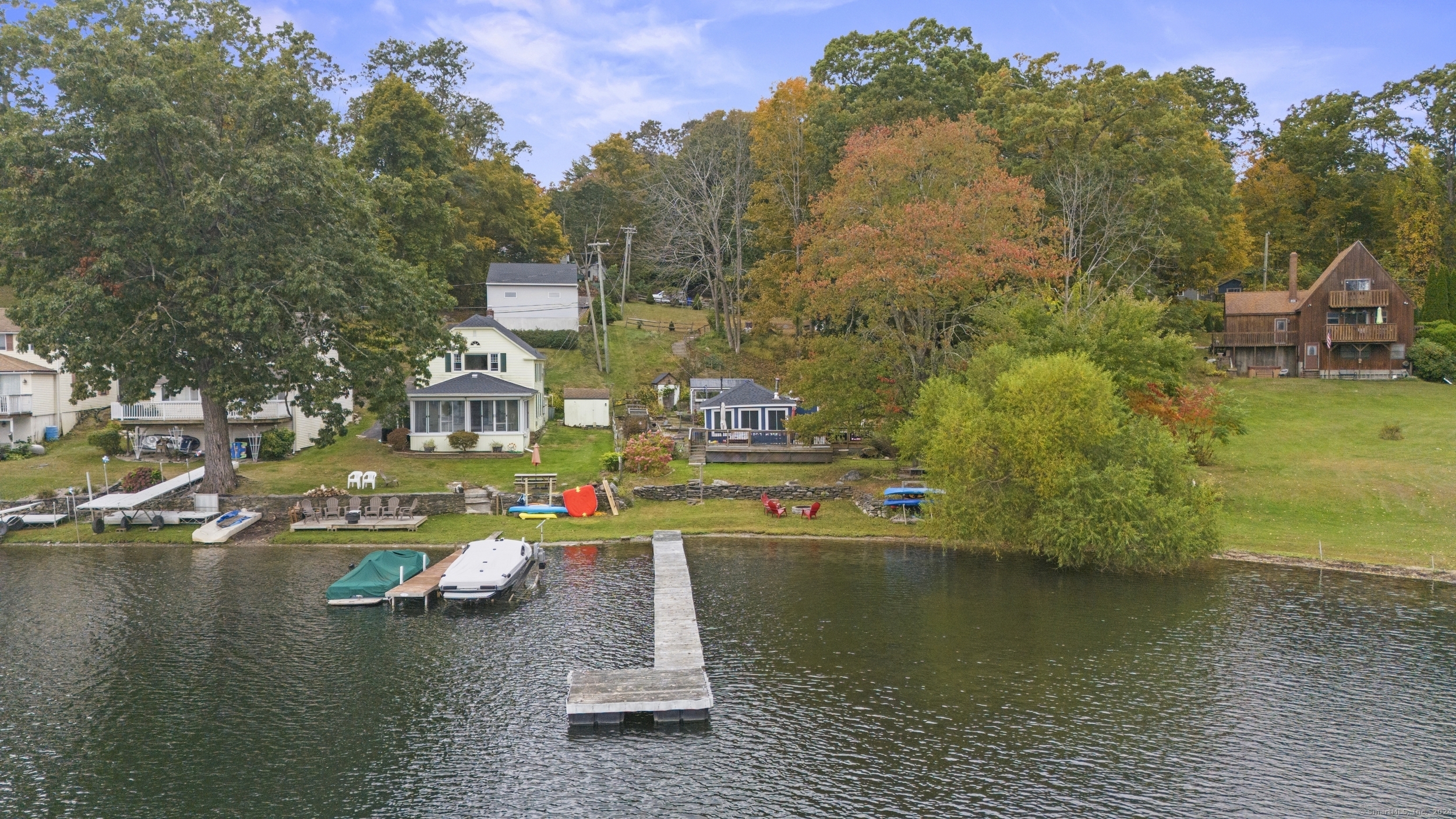 a view of a lake with a house in the background