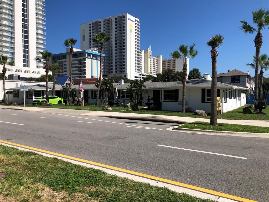 a view of a building with a street