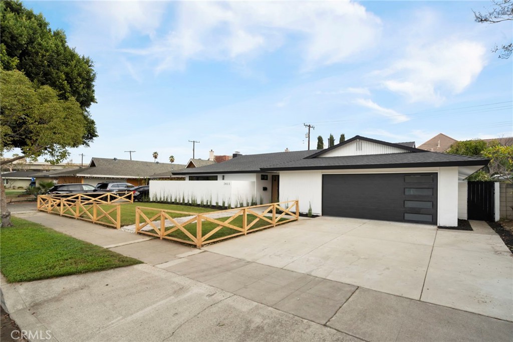 a view of a house with outdoor space and porch