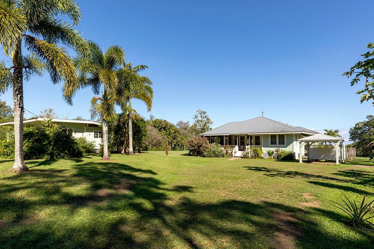 a view of a house with a big yard