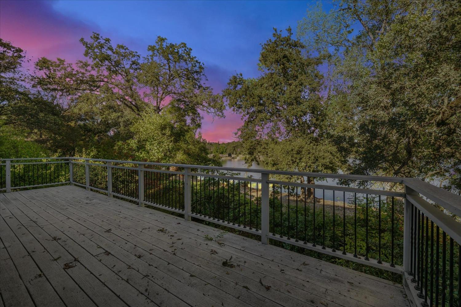 a view of a balcony with an outdoor space