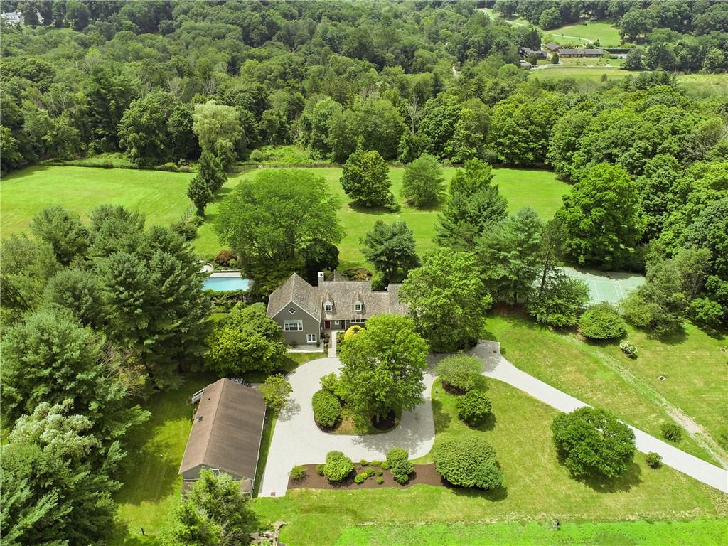 Just over 9 acres, barn, pool, court and 5 bedroom home