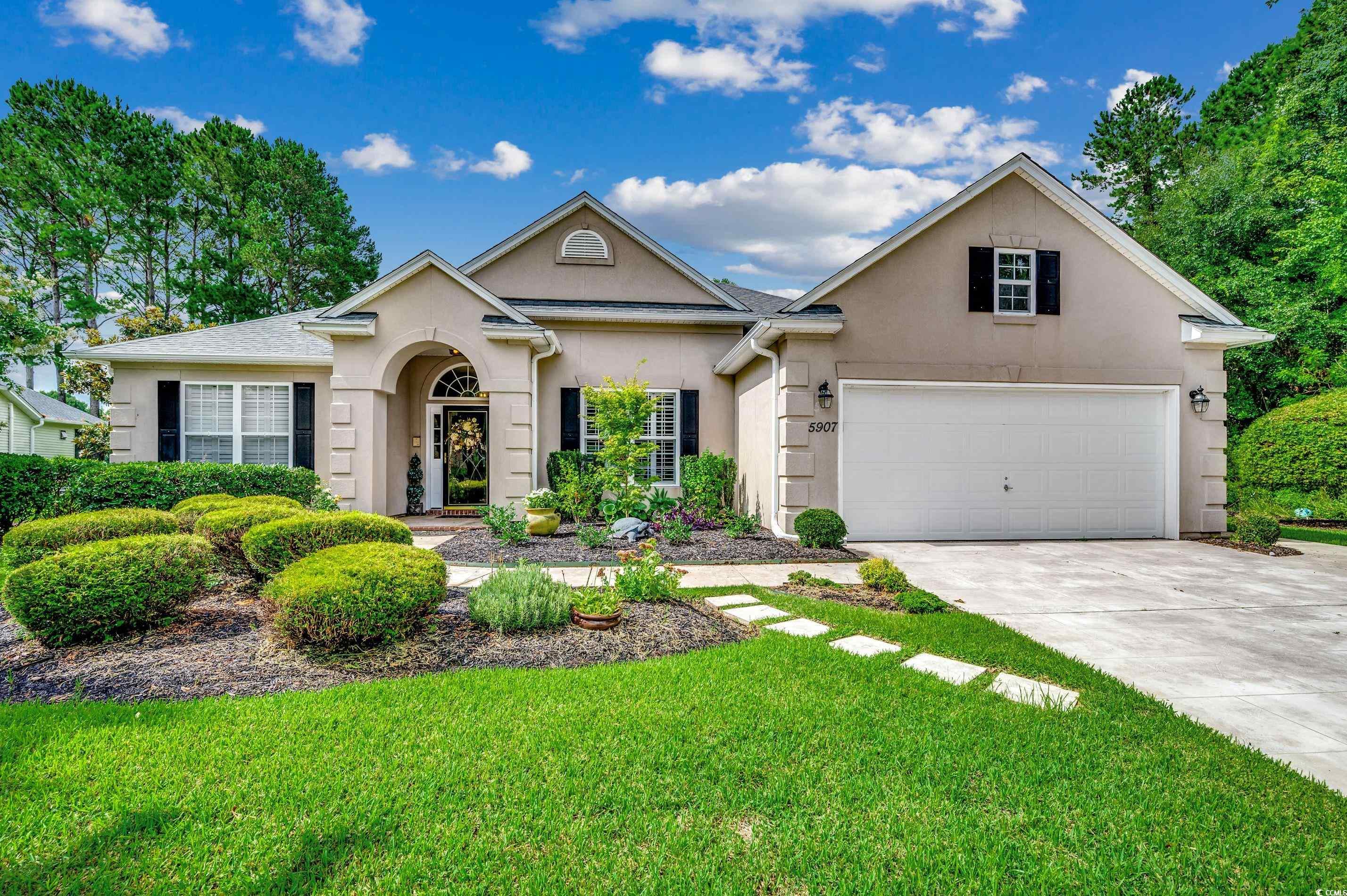 View of front of home featuring a front yard and a