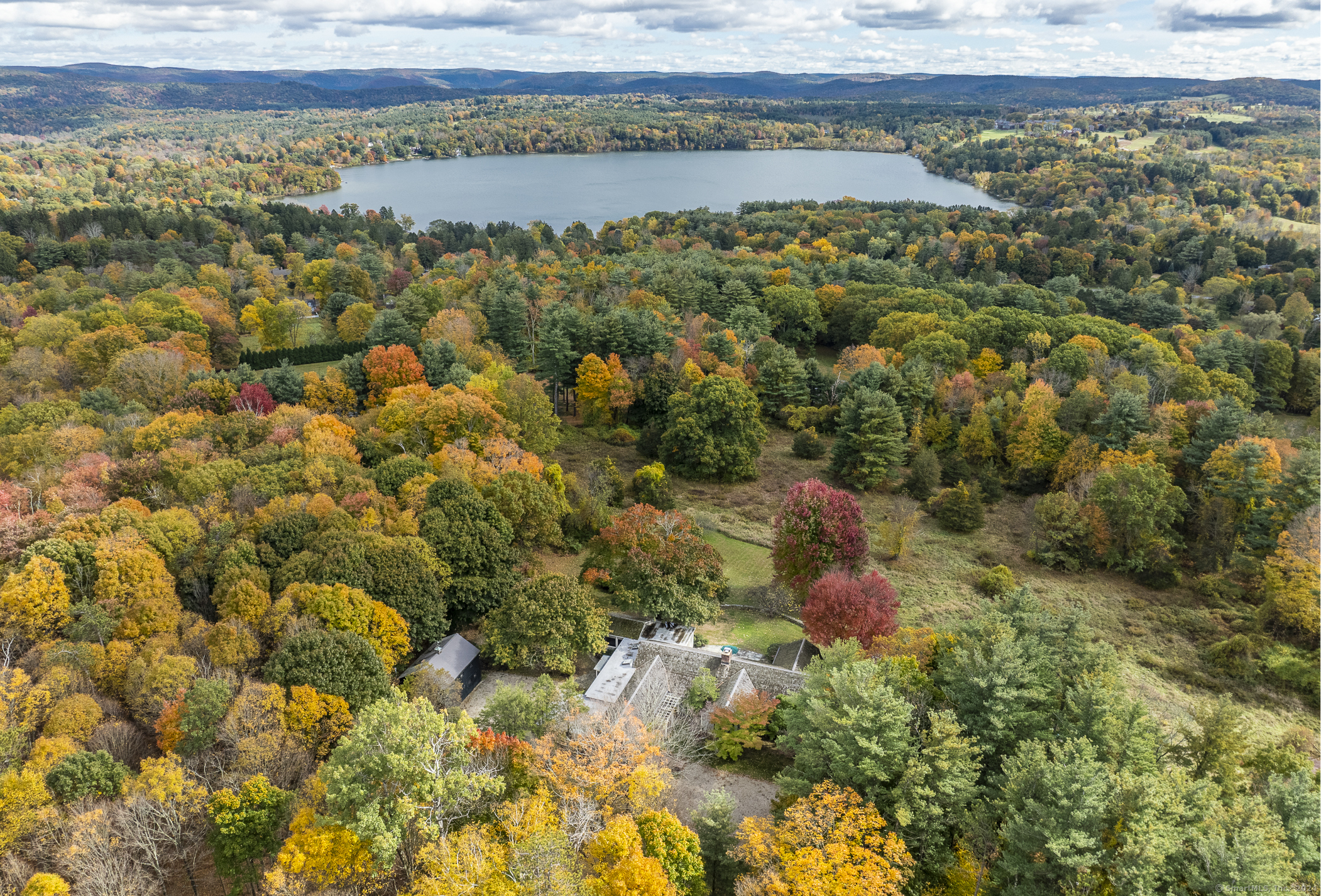 a view of lake with green space