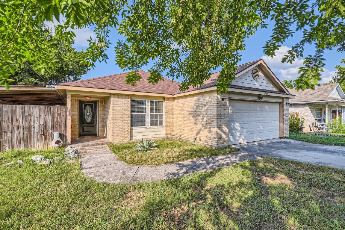 front view of a house with a yard