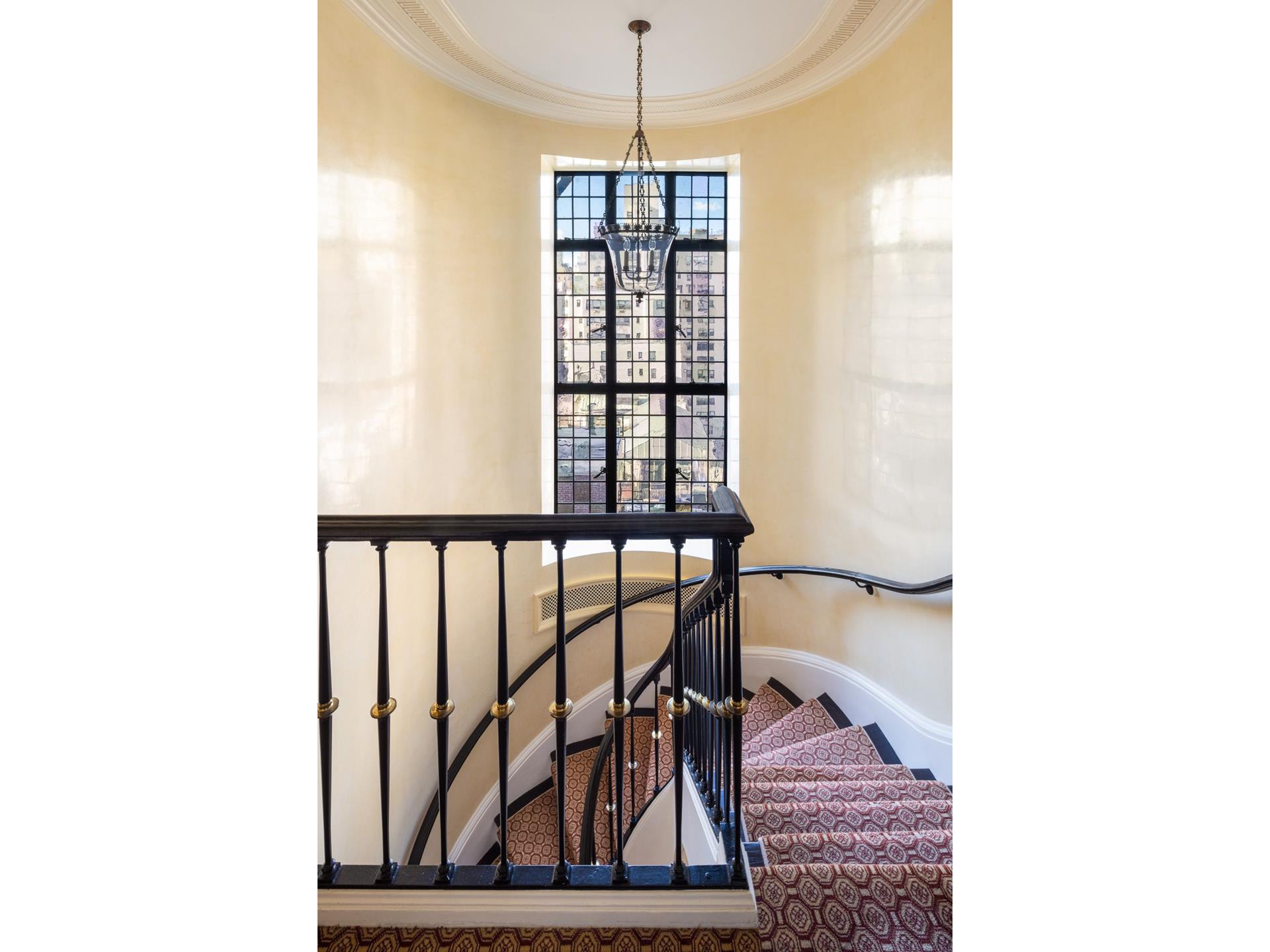 a view of entryway with a table and chairs