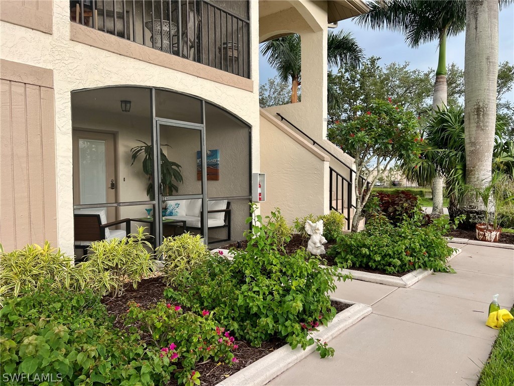 front view of a house with a garden